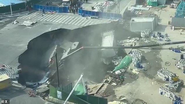 Shanghai Sinkhole Devastates Intersection: Harrowing Footage Shows 10-Meter Chasm, Subway Leak Suspected