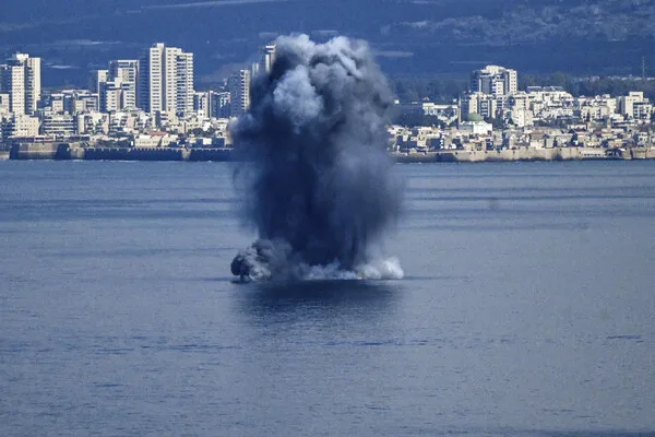 Hezbollah Claims Rocket Attack on Israeli Naval Base in Haifa, Escalating Tensions in the Middle East