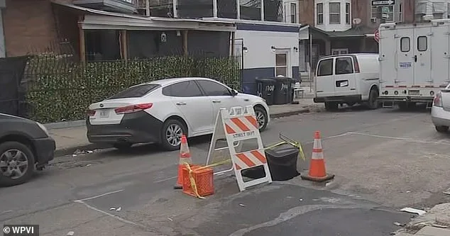 Philadelphia's Sinkhole Crisis: 1,000+ Reported Since December, 400 Still Open as Traffic Cone Marks Danger