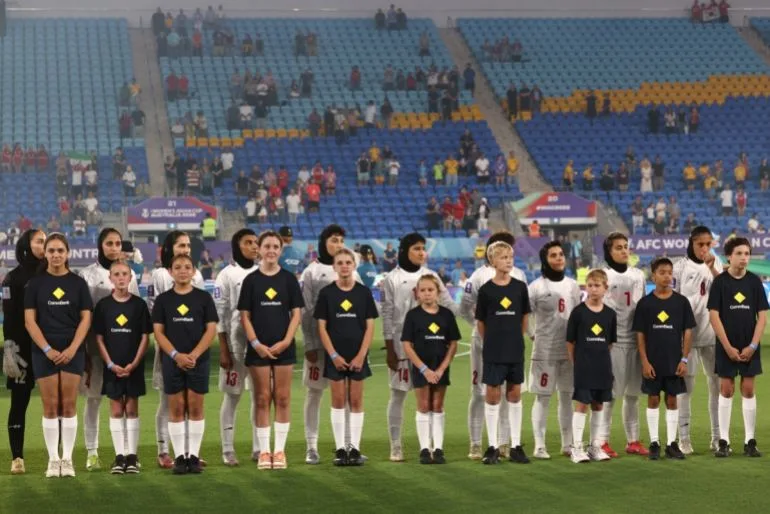 Iran's Women's Football Team Confronts Political Backlash Amid Controversial Return Home