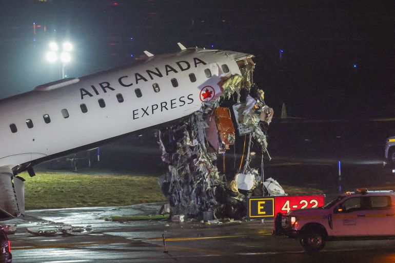 LaGuardia Airport Crash: 2 Dead, 13 Injured After Canada Air Jet Hits Fire Truck