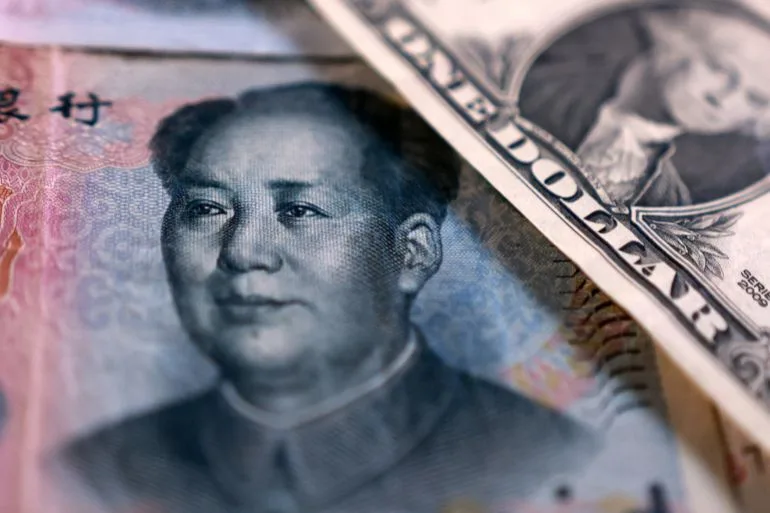 Iran and China Challenge U.S. Dollar Dominance Amid Hormuz Tensions