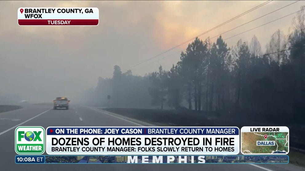 Georgia fires destroy homes as 90 blazes rage amid drought emergency.