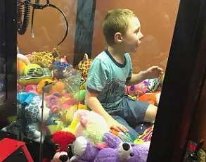 Exclusive Surveillance Footage Shows 6-Year-Old Trapped in Claw Machine at Mason Community Center