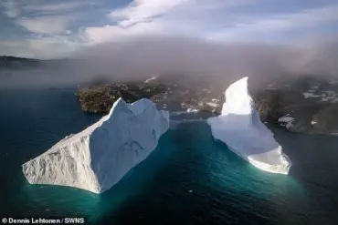 Huge Iceberg Drifts Dangerously Close to Greenland Shore, Threatening Infrastructure and Prompting Emergency Warnings